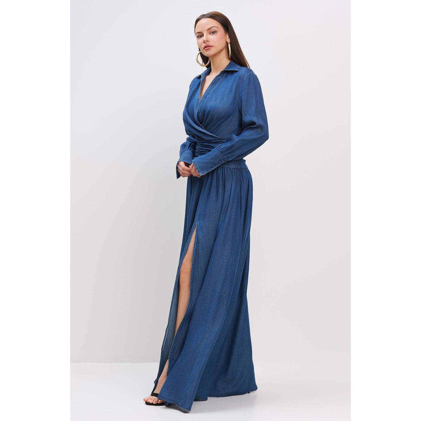 DENIM SURPLICE FRONT SHIRRED WAIST MAXI DRESS